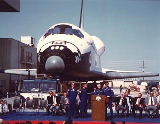 The astronauts assigned to Discovery’s first mission, STS-41D, speak to the assembled crowd