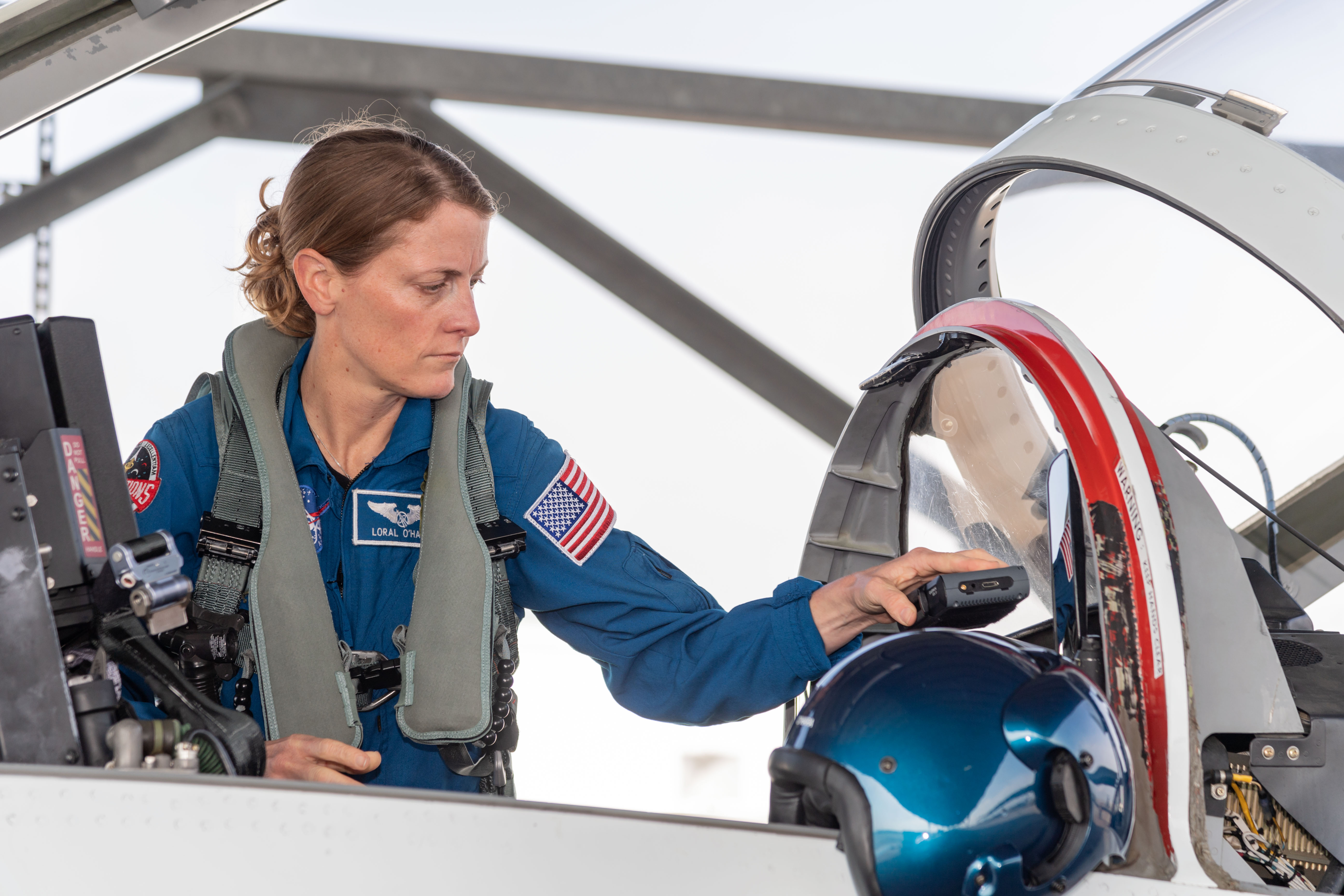 NASA astronaut Loral O'Hara conducts preflight training aboard a T-38 trainer jet at Ellington Field in Houston, Texas, before beginning her mission to the International Space Station.