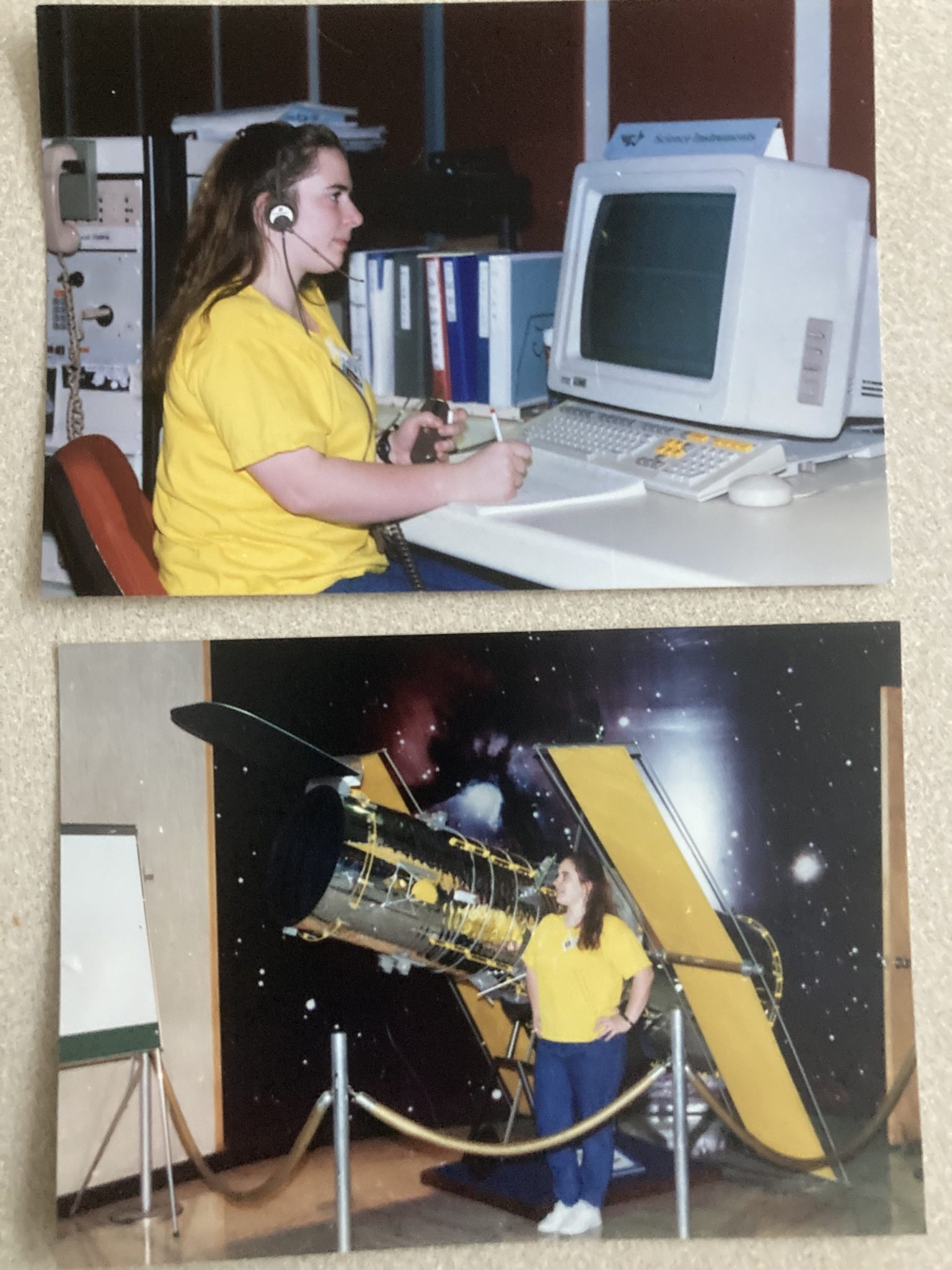 Two vintage photos showing Lynn Bassford, a woman with long brown hair, in the 1990's. She wears a yellow T-shirt, jeans, and white tennis shoes in both photos. In the top photo, she sits at a desk wearing a headset and working on an old desktop computer, with books, manuals and other equipment visible behind her. In the lower photo, she poses in front of a full-scale model of the Hubble Space Telescope. Hubble looks like a silver cylinder with long, rectangular solar panels attached to each side.