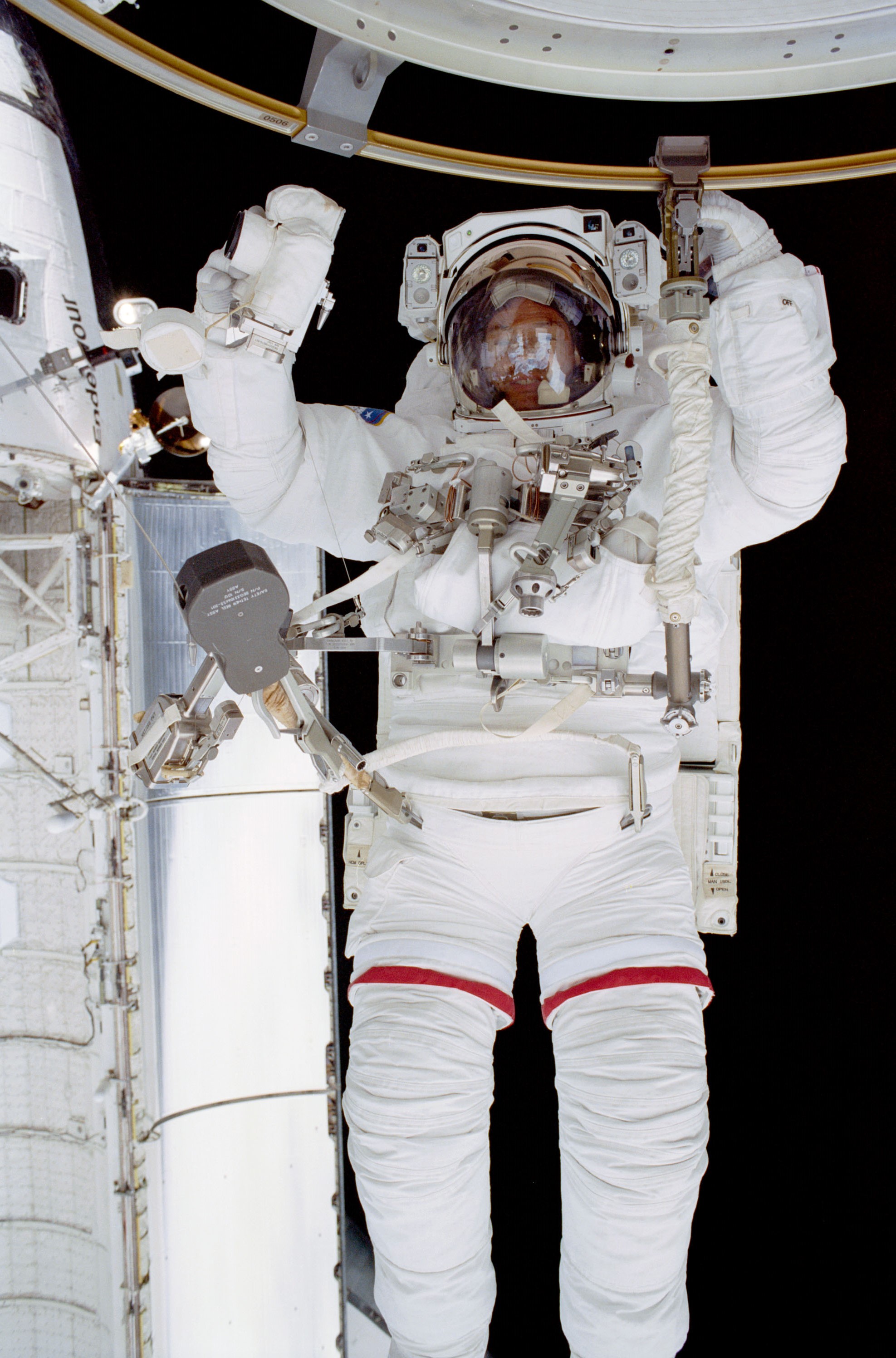 NASA astronaut Michael E. Lopez-Alegria during the first STS-113 spacewalk.