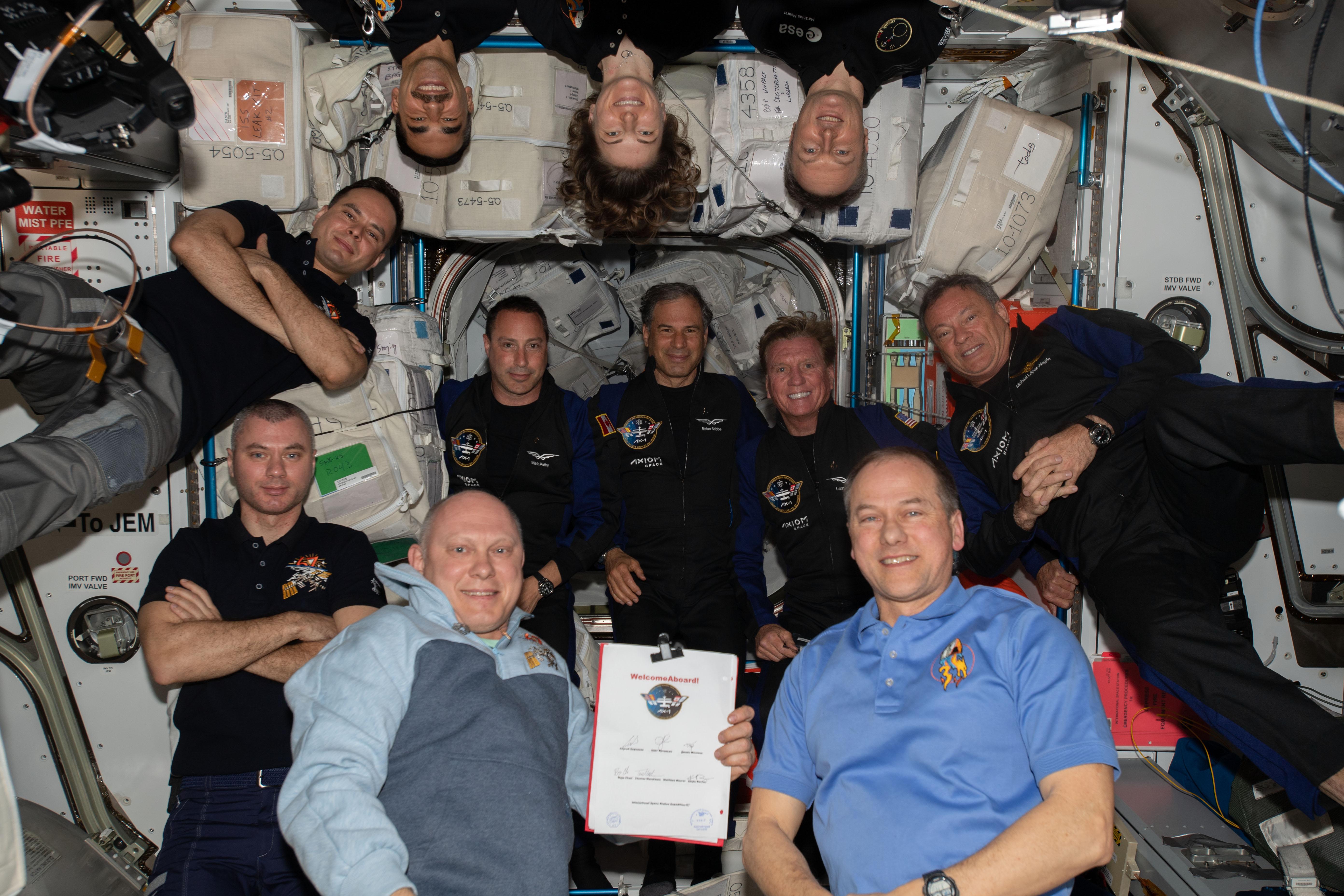 The 11 crew members aboard the space station during the Ax-1 mission, with Lopez-Alegria at far right.