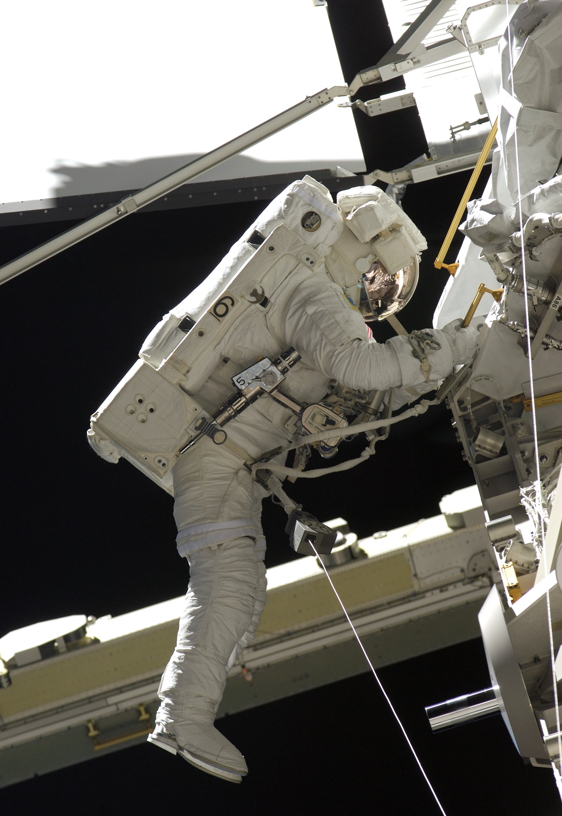 NASA astronaut John D. “Danny” Olivas during an STS-117 spacewalk working on the S3/S4 truss installation.