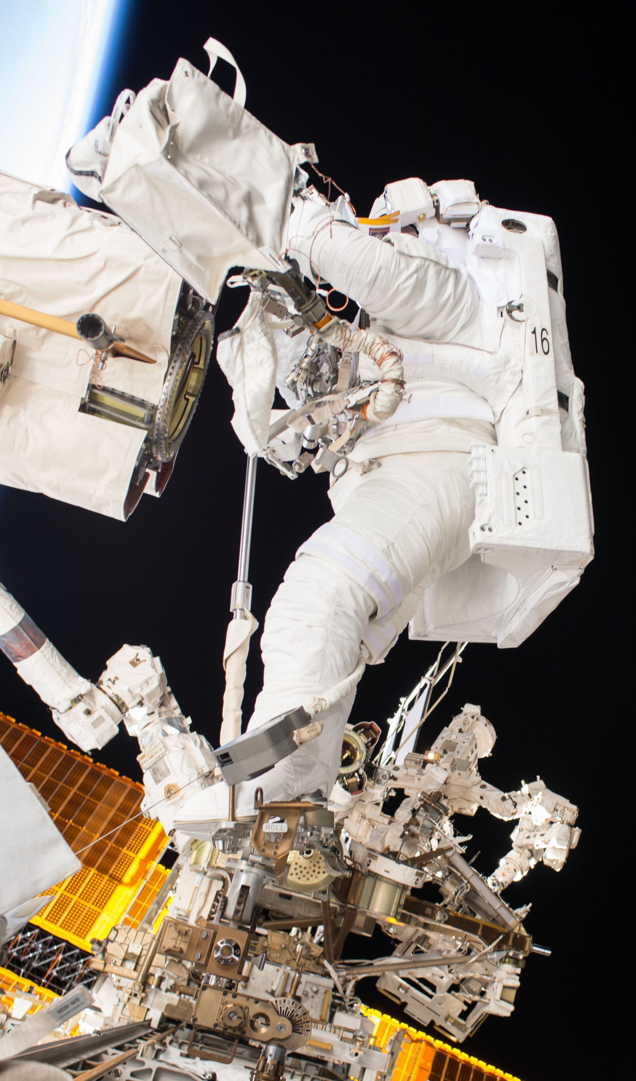 During a spacewalk, Acaba is lubricating the Candarm2 Latching End Effector