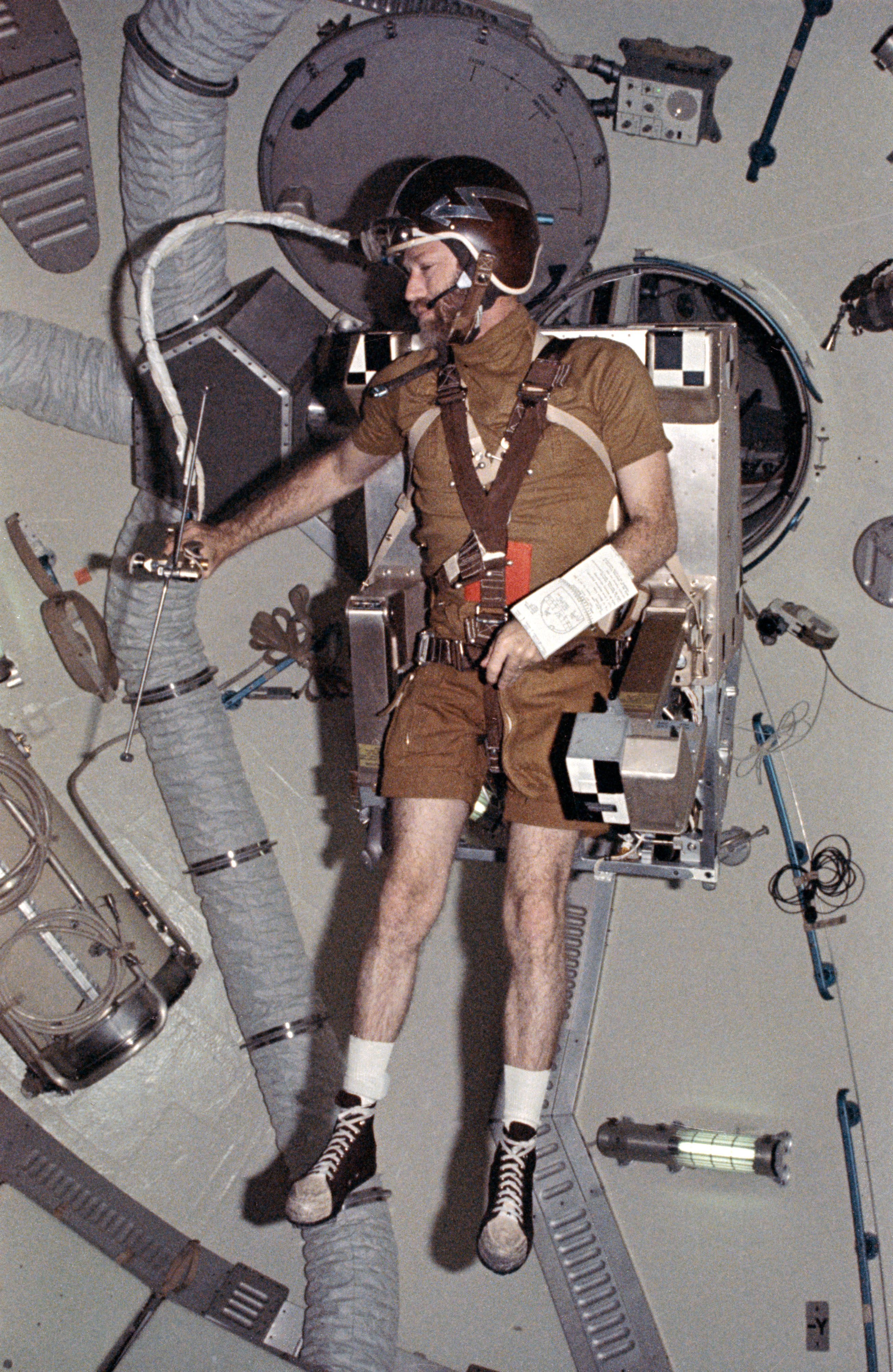 Gerald P. Carr flies the Astronaut Maneuvering Unit