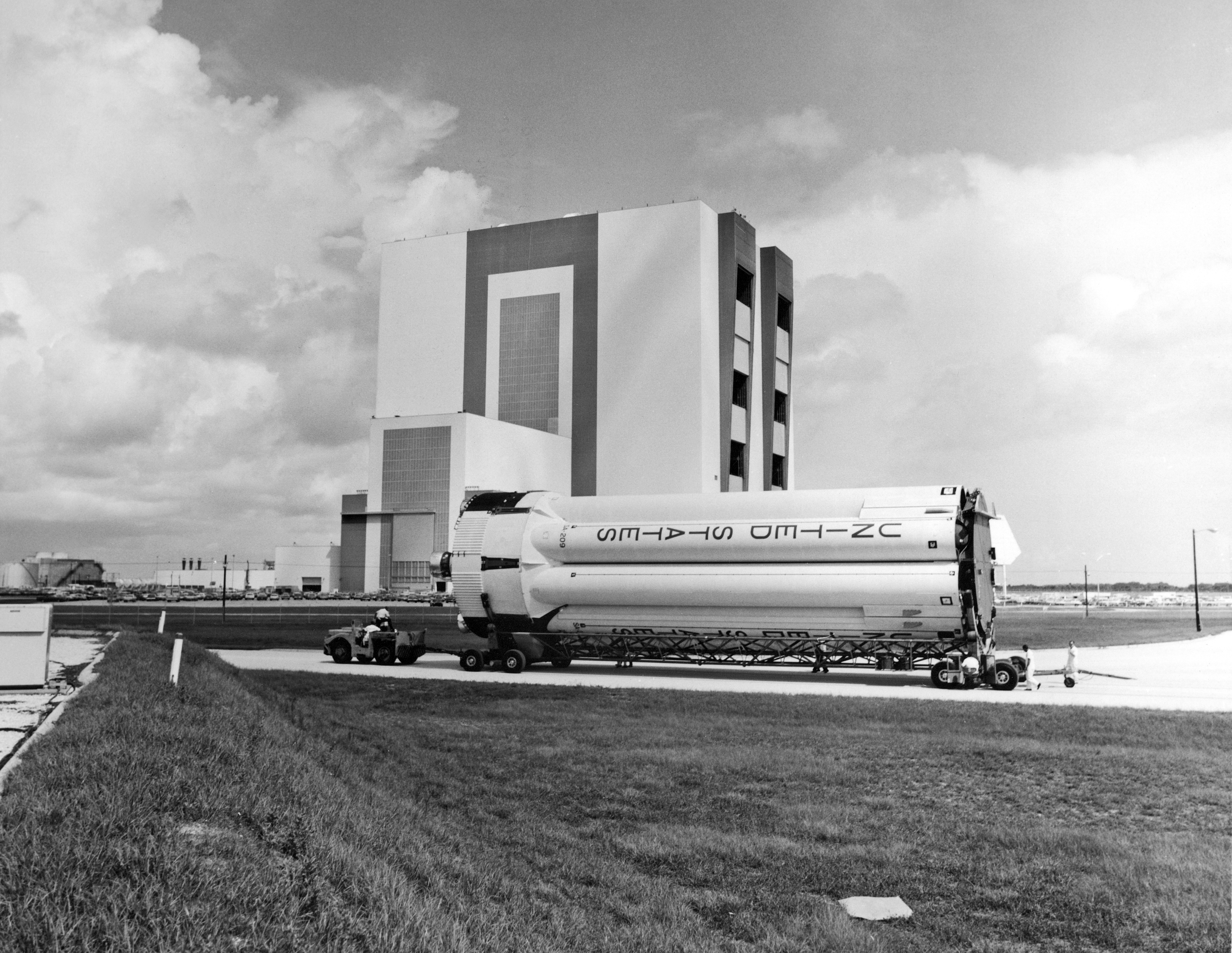 The S-IB first stage for Saturn-IB SA-209, the Skylab 4 rescue mission, arrives at the Vehicle Assembly Building (VAB) at NASA’s Kennedy Space Center