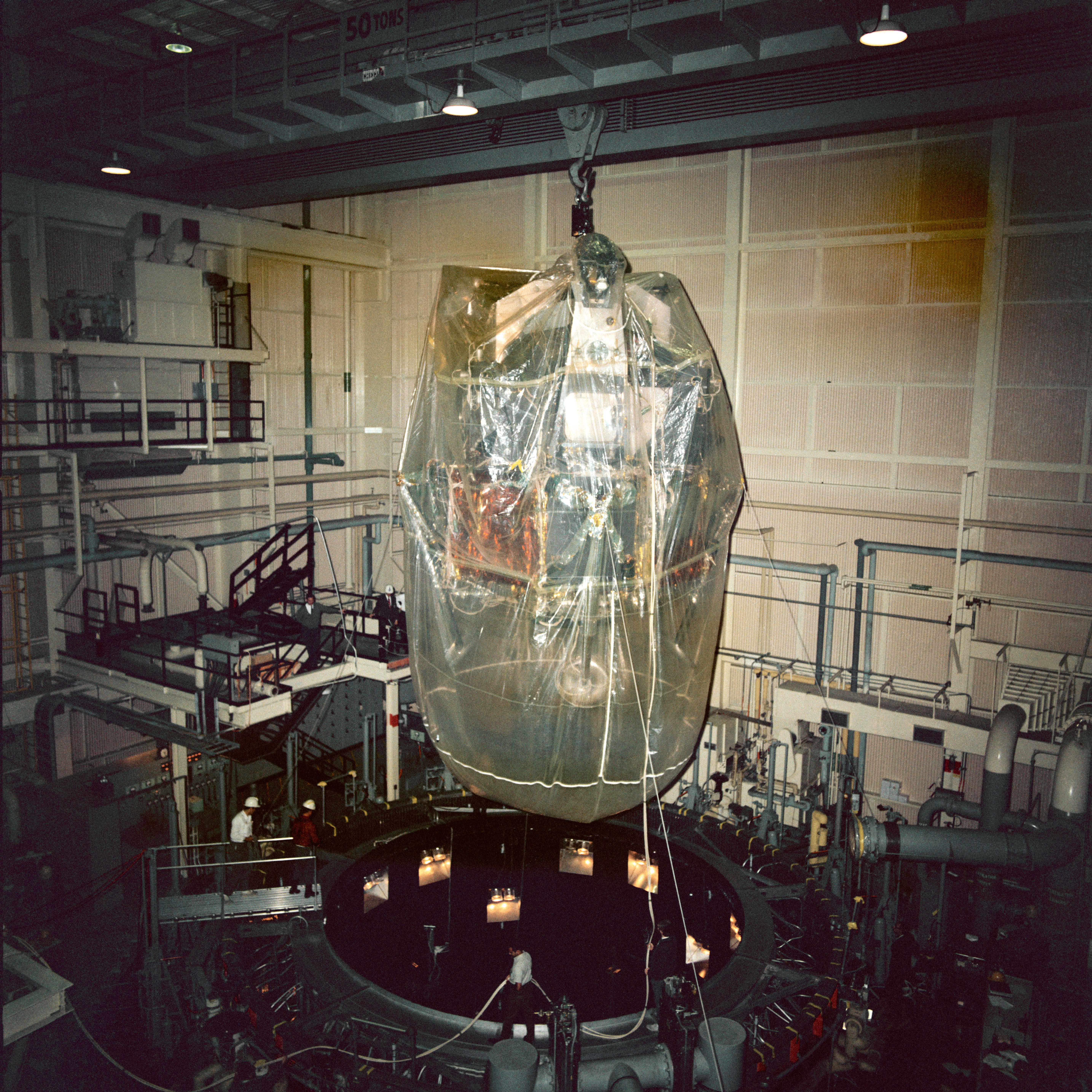 Workers remove LTA-8 from SESL’s Chamber B at the conclusion of the altitude tests