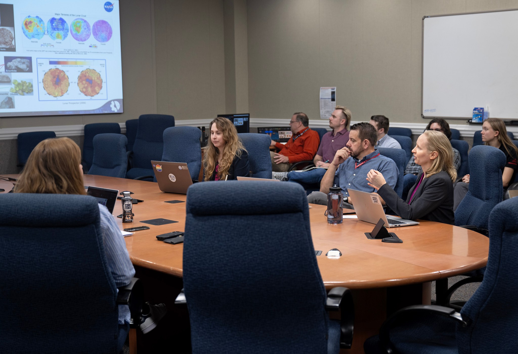 Geologist Jennifer Edmunson, from right, discusses lunar regolith and infrastructure plans during a brown bag seminar Nov. 7 at NASA’s Marshall Space Flight Center that highlighted the center’s Moon/Mars Surface Technologies and Systems business unit.