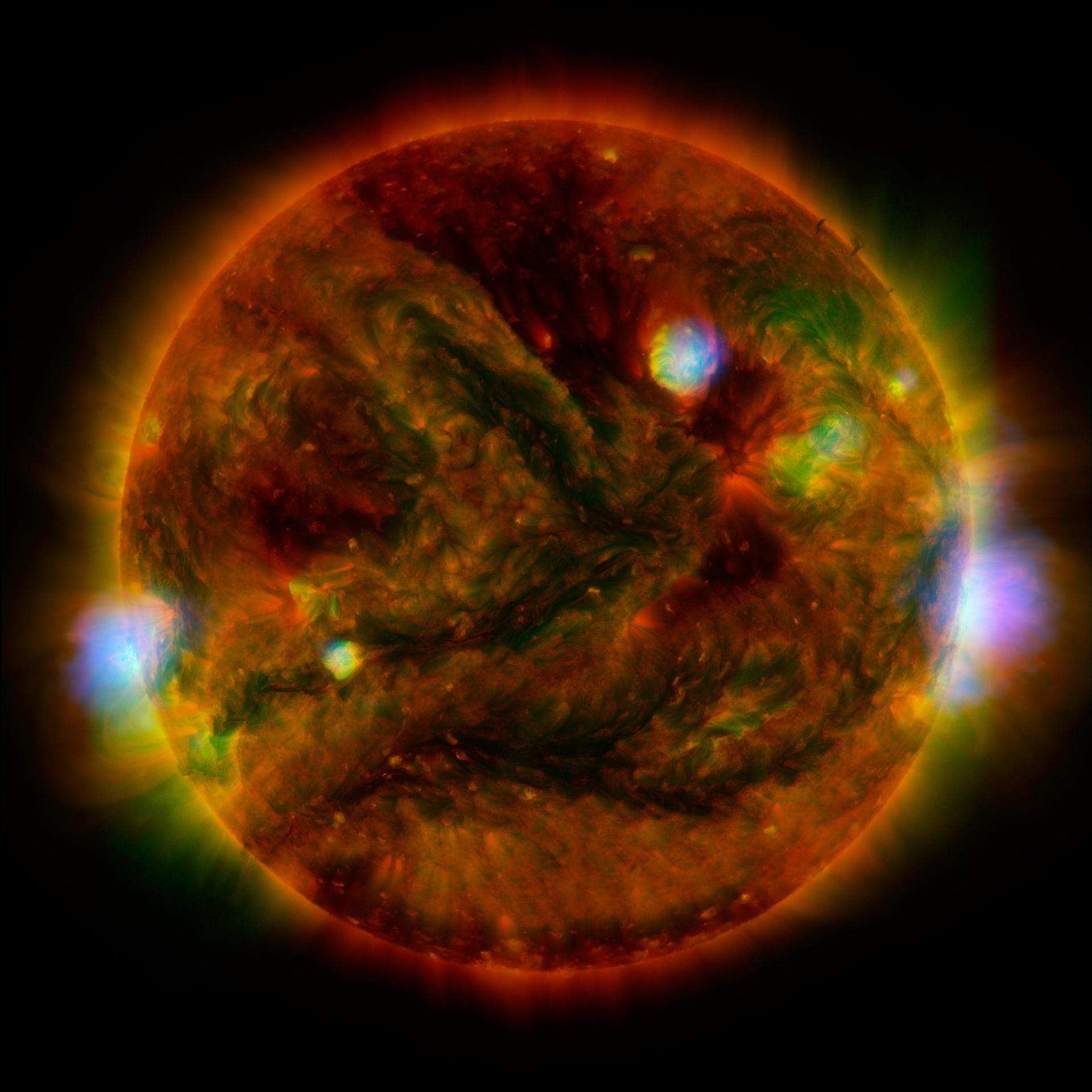 Flaring, active regions of our sun are highlighted in this image combining observations from NASA's NuSTAR. During the observations, microflares went off, which are smaller versions of the larger flares that also erupt from the sun surface.