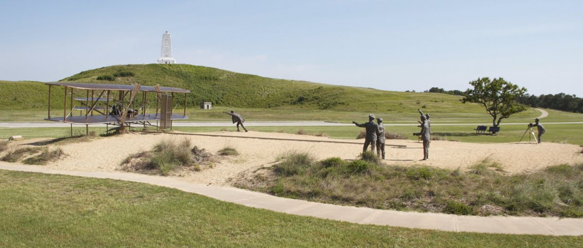 Bronze statues recreate the day of the first powered flight at the Wright Brothers National Memorial near Kitty Hawk, North Carolina