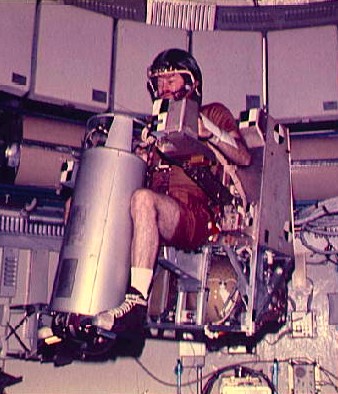 Gerald P. Carr flying the Astronaut Maneuvering Unit