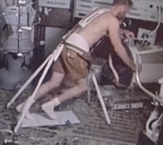 Gerald P. Carr exercises on the Thornton treadmill