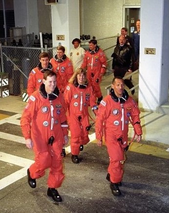 The STS-60 crew departs crew quarters for Launch Pad 39A