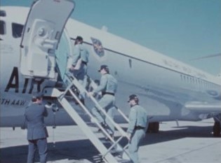 Carr, top, Gibson, and Pogue board a U.S. Air Force transport jet at North Island NAS that flew them to Houston