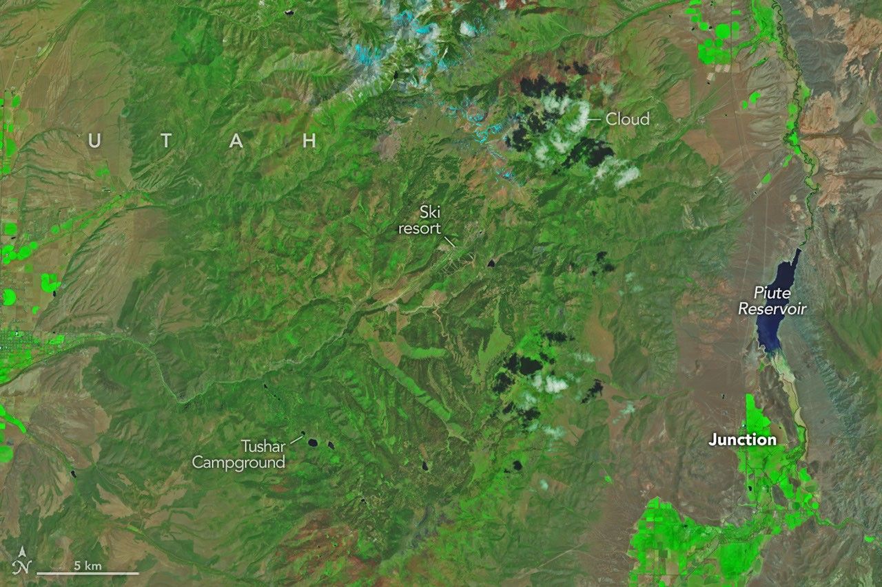 Mountainous landscapes appear green and untouched by fire in a satellite image acquired on June 5, 2026.